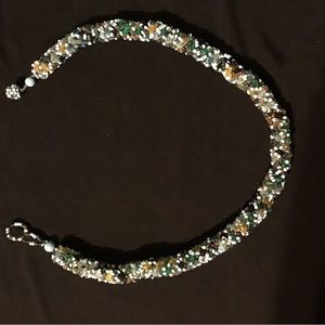 Beautiful beaded necklace, assorted colors, mainly turquoise and blues.